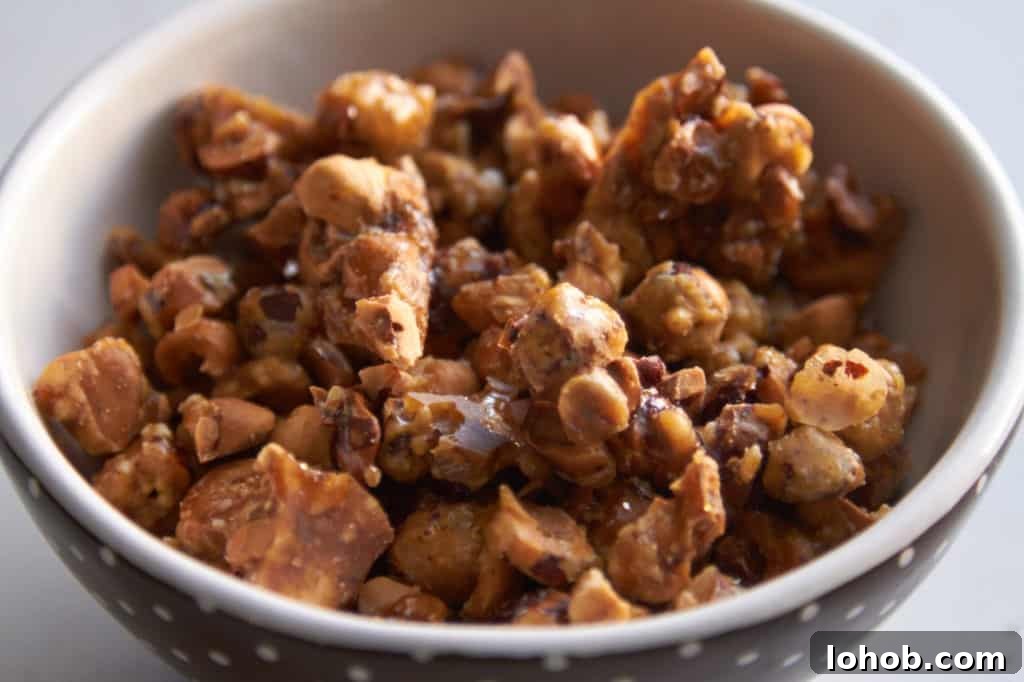 Crunchy Candied Hazelnuts Recipe for Snacks & Gifts 6 Candied hazelnuts in a bowl.