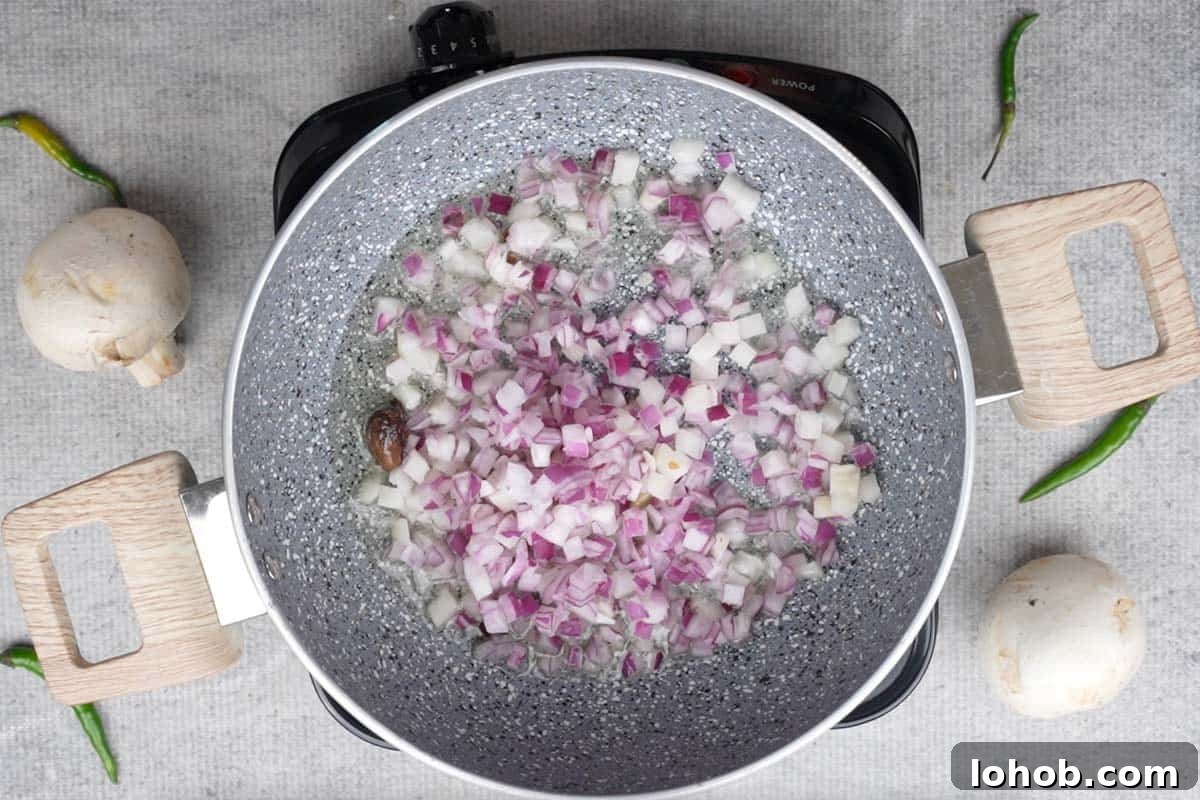 Onions added to the pan.