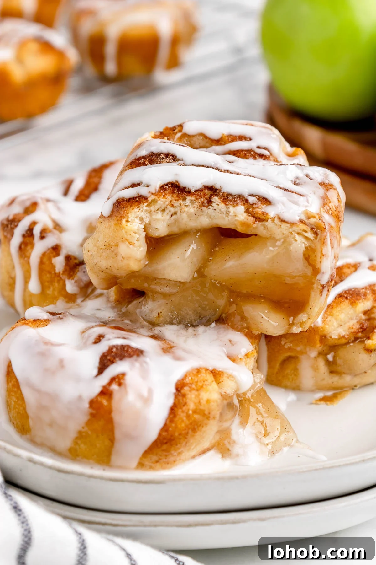 Mini Apple Pie Bites: Crispy Cinnamon Handheld Pastry Recipe 2 apple pie bites recipe on a plate