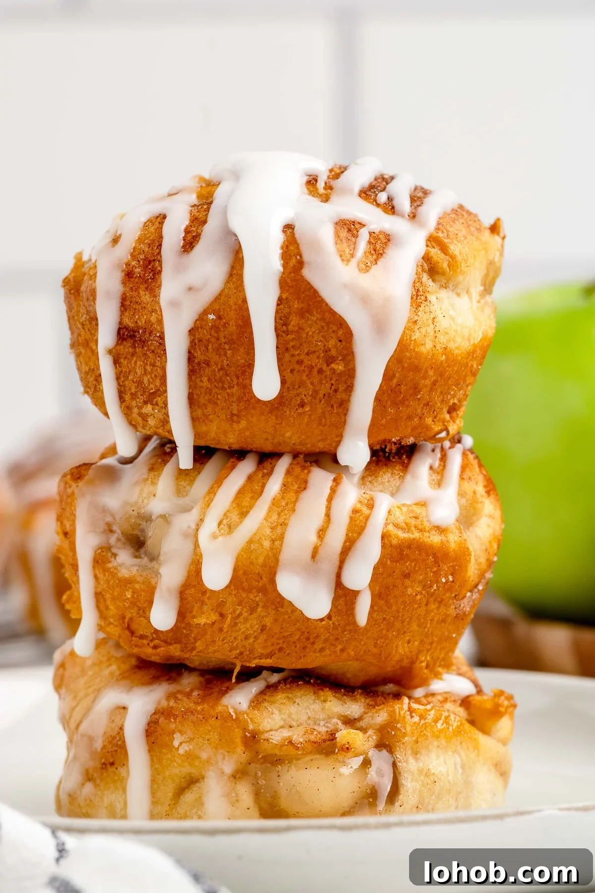 Mini Apple Pie Bites: Crispy Cinnamon Handheld Pastry Recipe 7 stack of mini apple pie bites on a plate