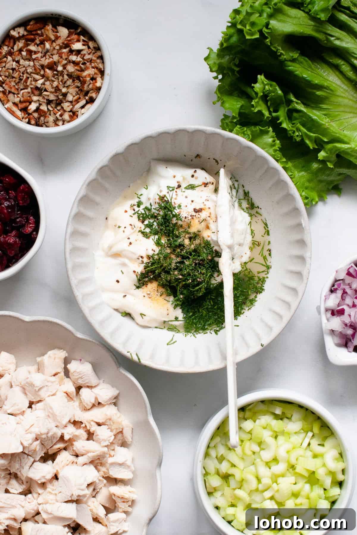 Cranberry Pecan Chicken Salad Recipe for Fresh, Crunchy Lunch 4 making healthy chicken salad