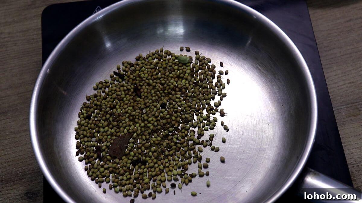 Roasting whole spices for tonak masala.