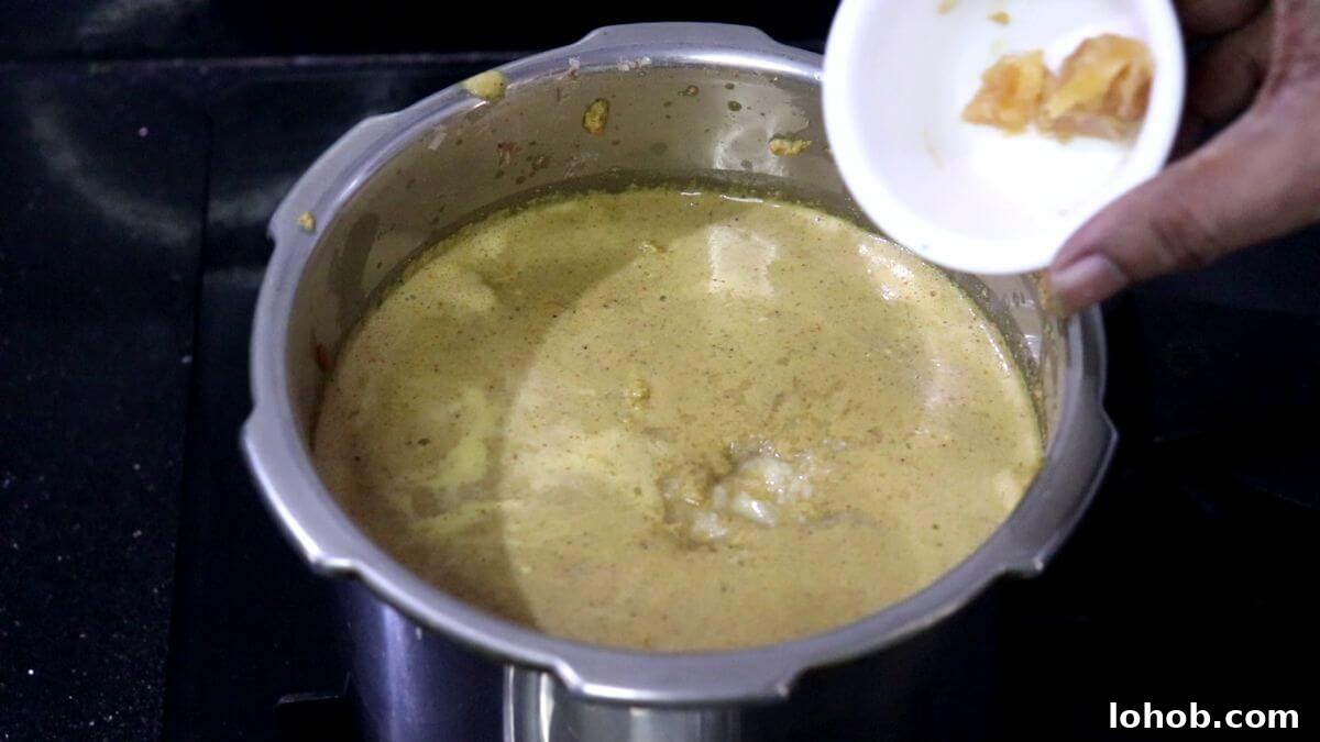 Addition of jaggery to alsanyache tonak.