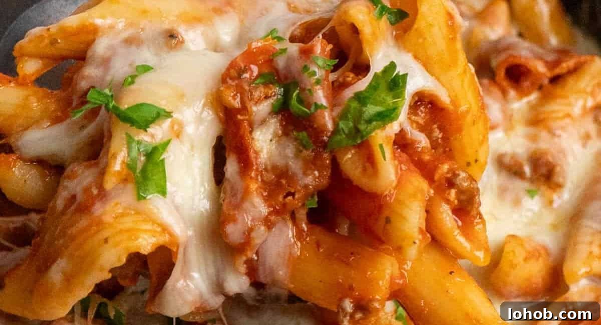 Up close image of crock pot pizza casserole with garnish.