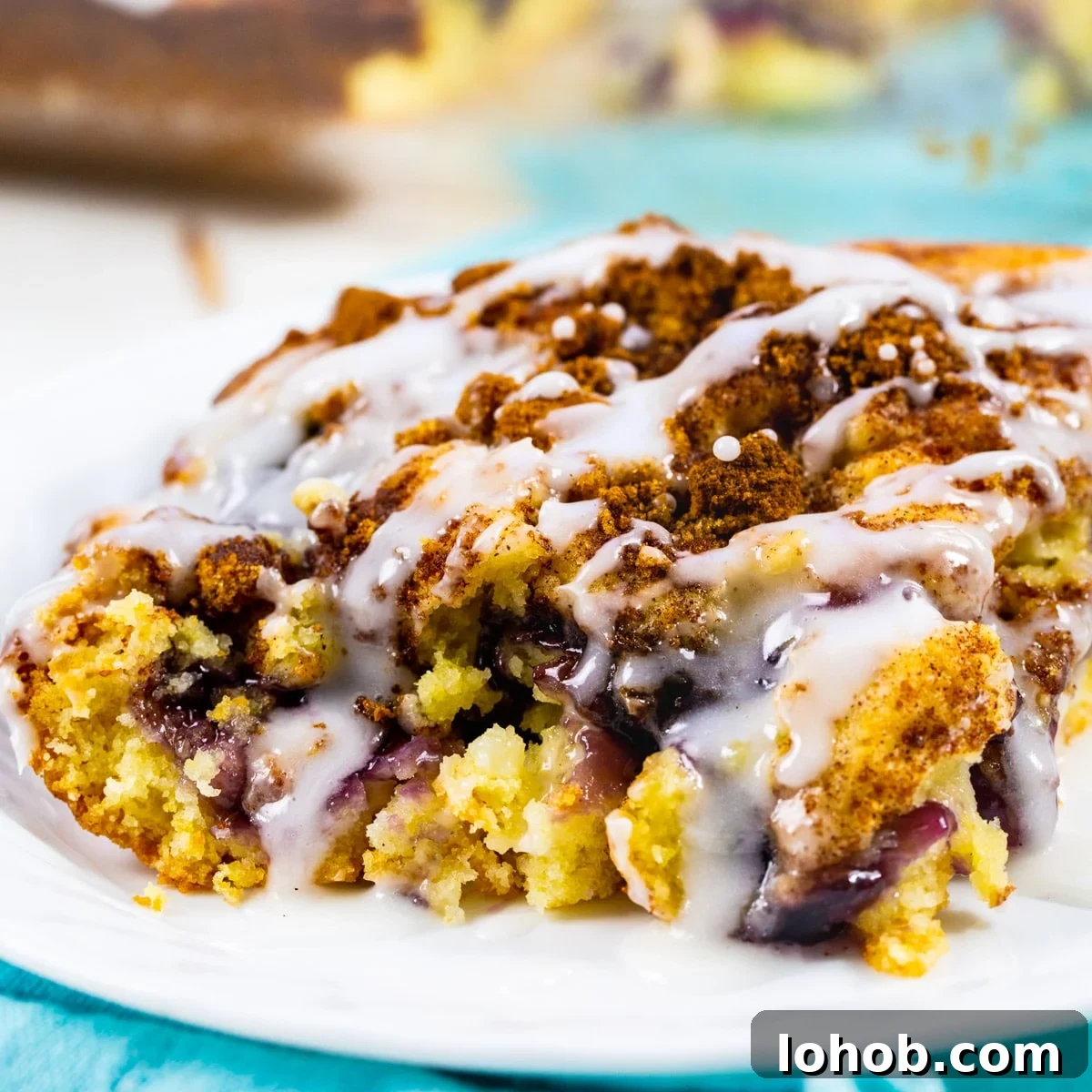 Slice of Blueberry Pie Coffee Cake on a plate.
