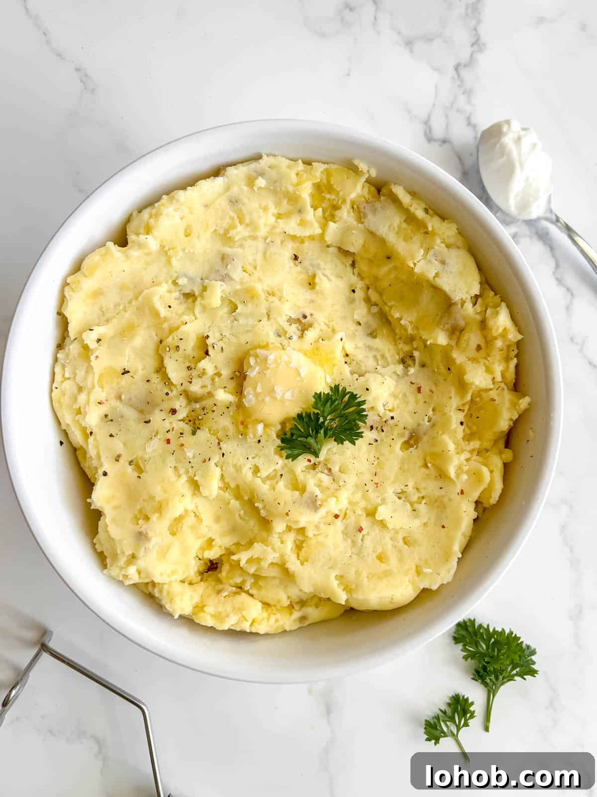 Greek yogurt mashed potatoes in a large bowl.