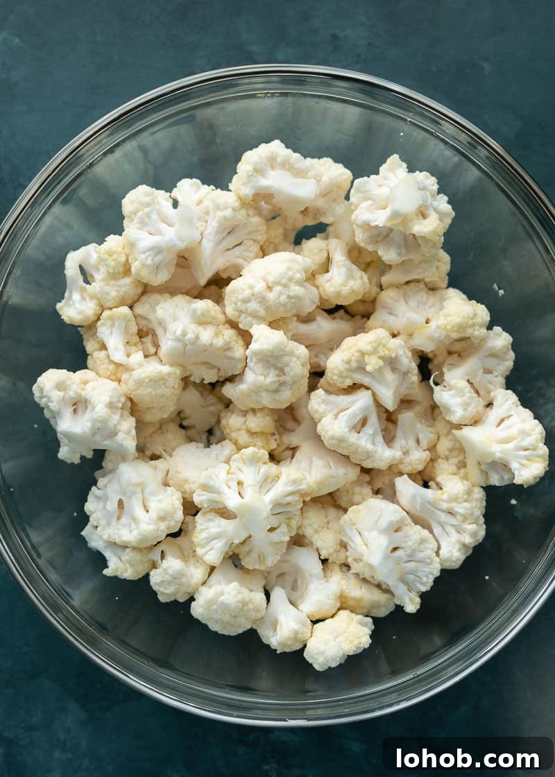 Air Fryer Parmesan Cauliflower close up, buttery and crispy with parmesan.