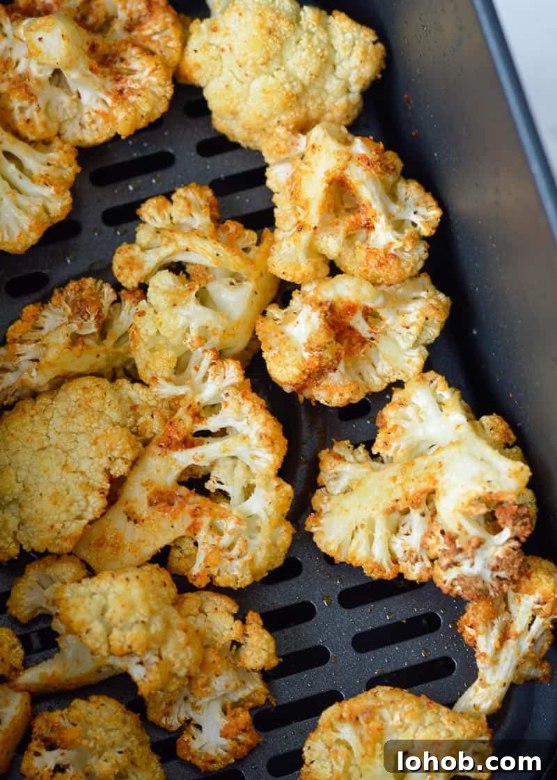 Crispy air fried cauliflower with golden tips.