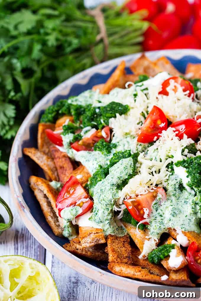 Homemade Healthy Nachos with Salsa Verde. Lot's of flavour and a touch of heat served on crunchy baked 'nachos'.