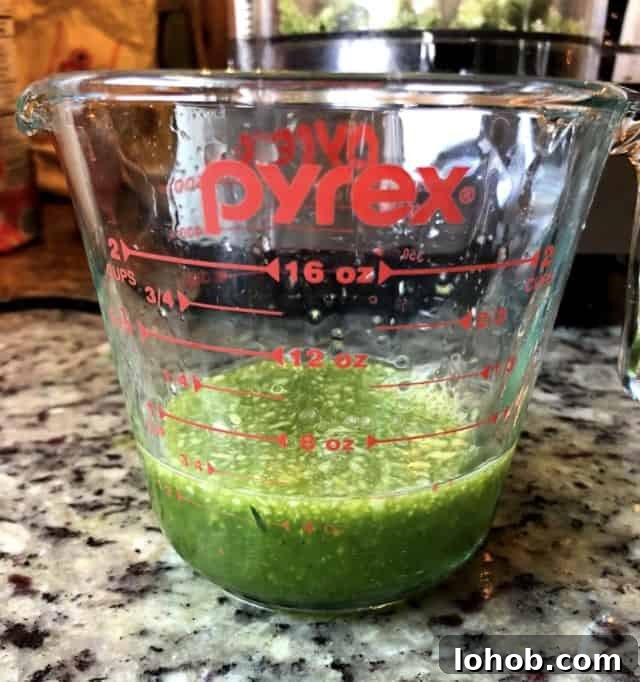 Crispy Fried Zucchini Chips Recipe for Perfect Snack 3 zucchini juice in a cup.