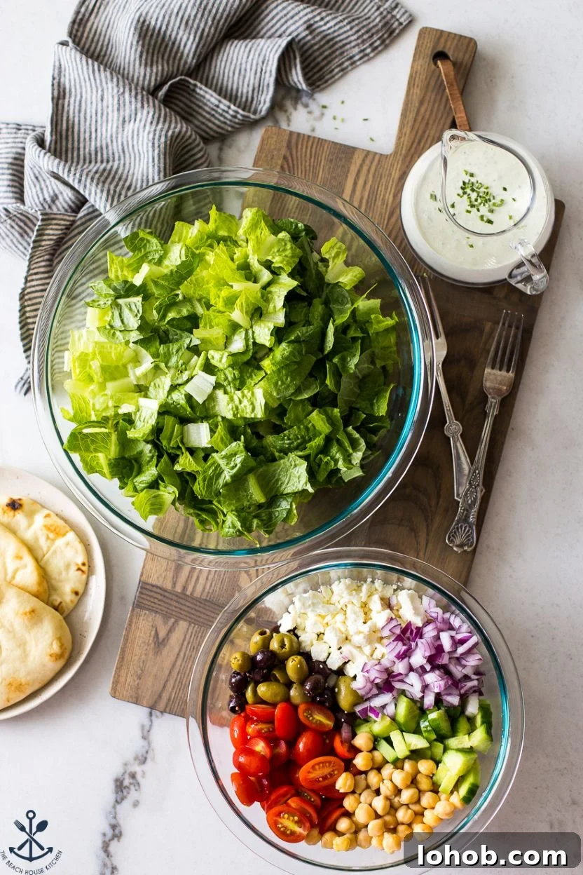 Greek Chickpea Salad with Creamy Green Goddess Dressing 4 Overhead photo of ingredients for a Greek Chickpea Salad with Green Goddess Dressing