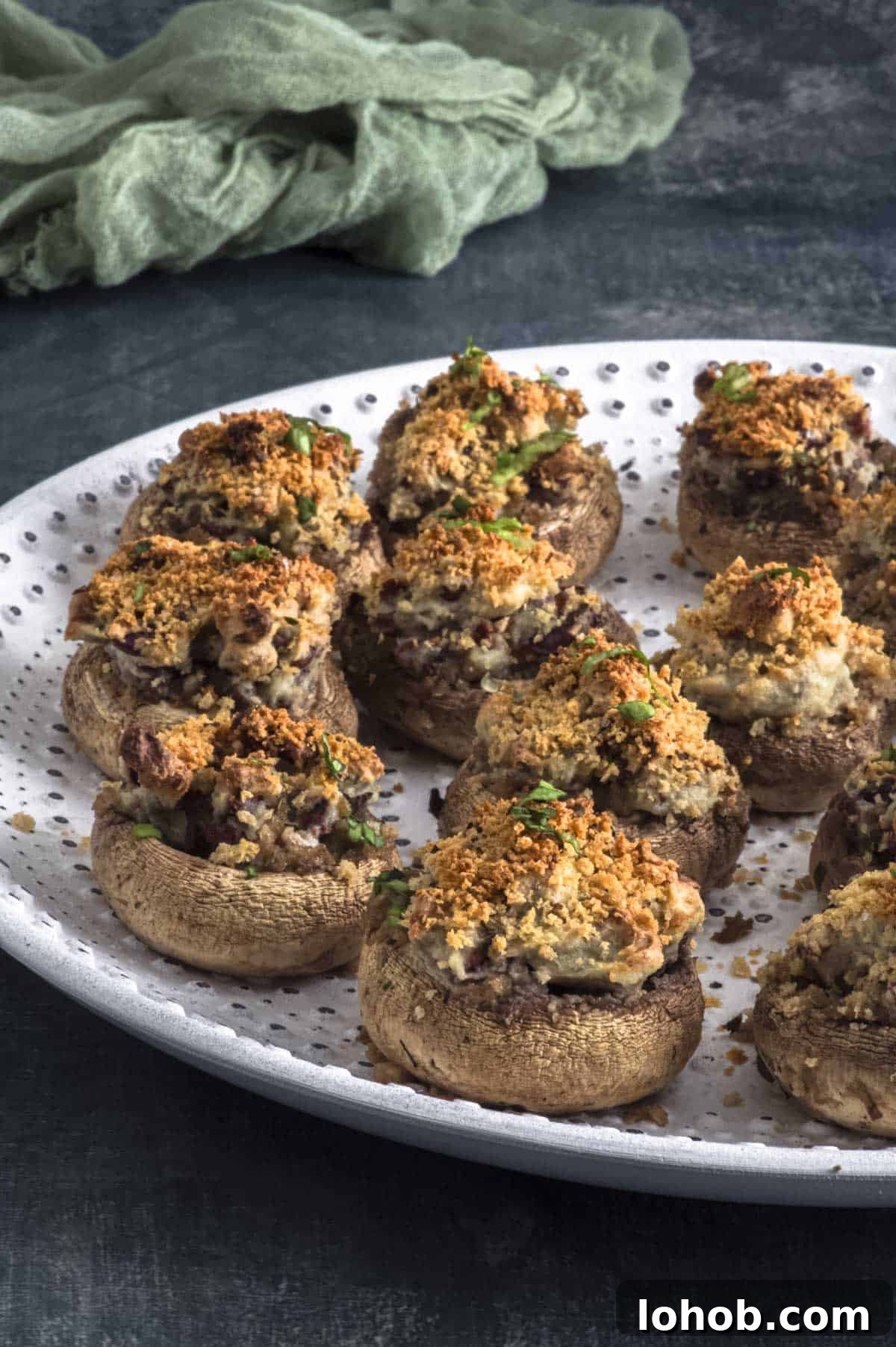 Close up view of a plate with stuffed mushrooms
