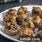 Close up view of a plate with stuffed mushrooms