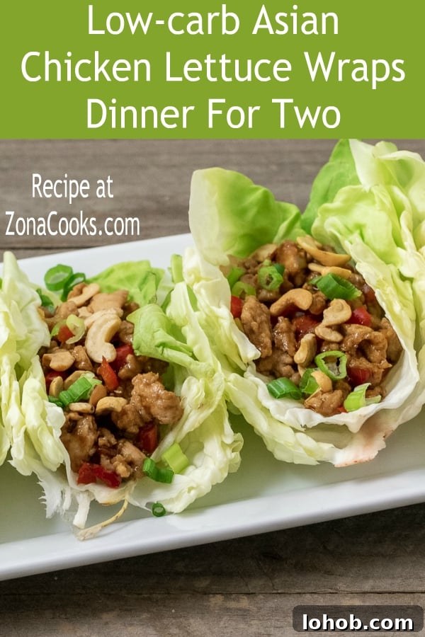 a graphic of Healthy Asian Chicken Lettuce Wraps close up front view of two wraps on a platter.