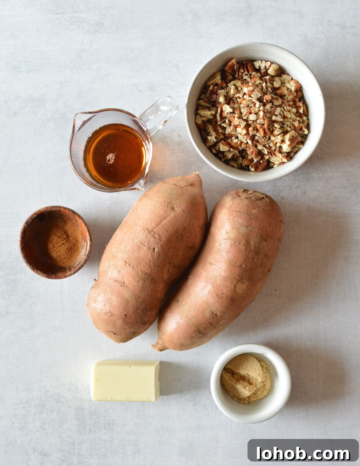 Roasted Sweet Potato Slices with Maple Candied Pecans 3 a bowl of chopped pecans, maple syrup, cinnamon,. sweet potatoes, butter, and brown sugar.