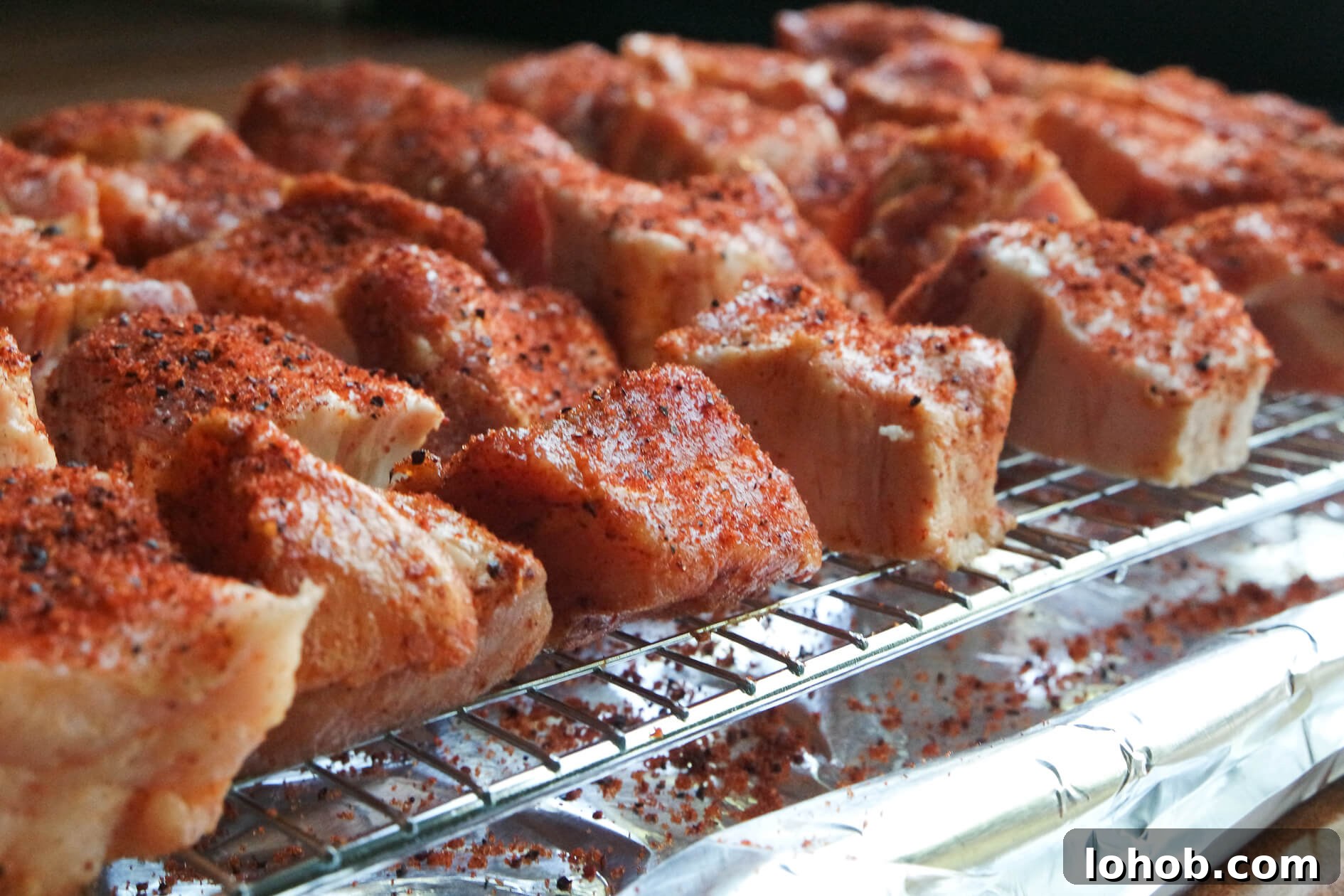 Smoky BBQ Pork Belly Burnt Ends Recipe for Tender, Crispy Bites 2 seasoned pork belly to make burnt ends