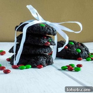 gluten free chocolate cake cookies wrapped in a ribbon on a white board