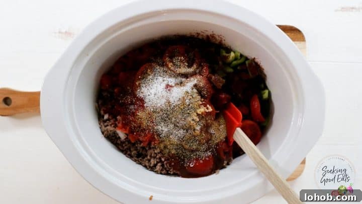 Texas-Style Crock Pot Chili Recipe (No Beans) 4 Adding the remaining chili ingredients to the slow cooker