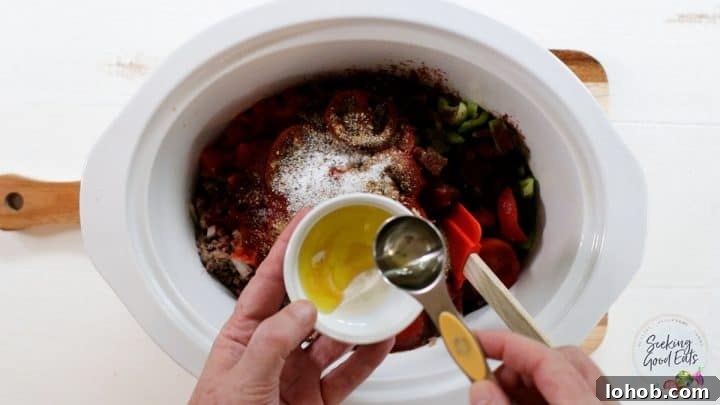 Texas-Style Crock Pot Chili Recipe (No Beans) 5 Mixing thickener and adding to the chili