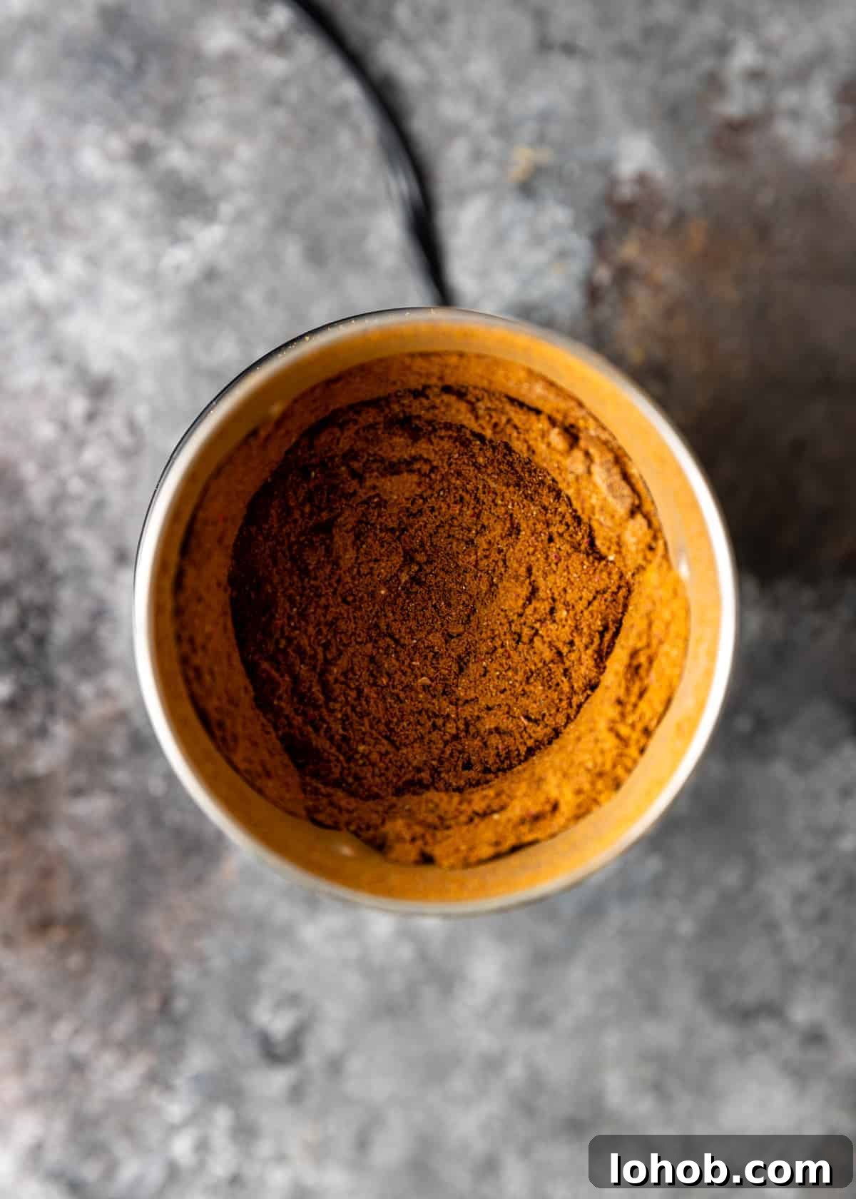 overhead image: looking down into bowl of full of persian spices in advieh