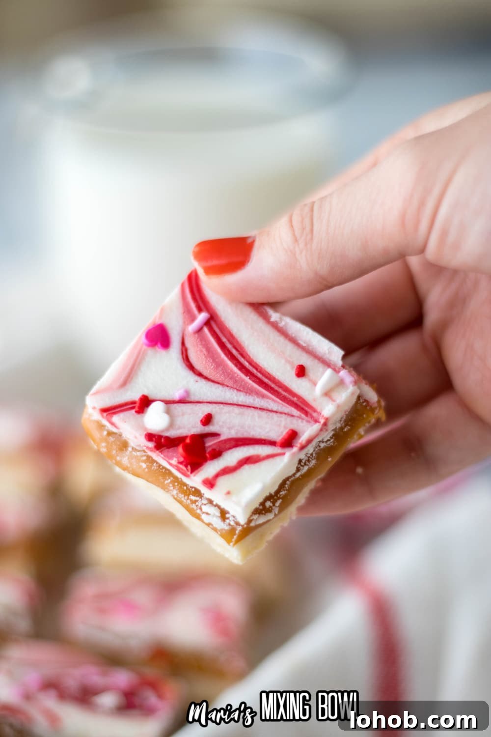 valentine millionaire bar held in a woman's hand