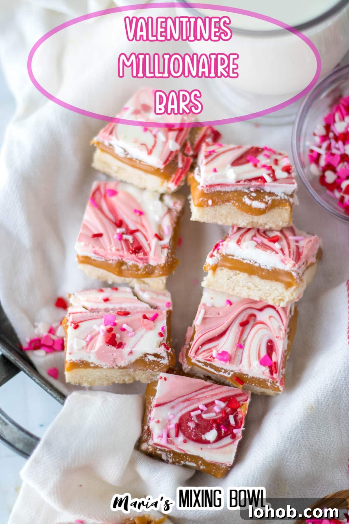 pieces of valentine's millionaire bars on a towel lined basket