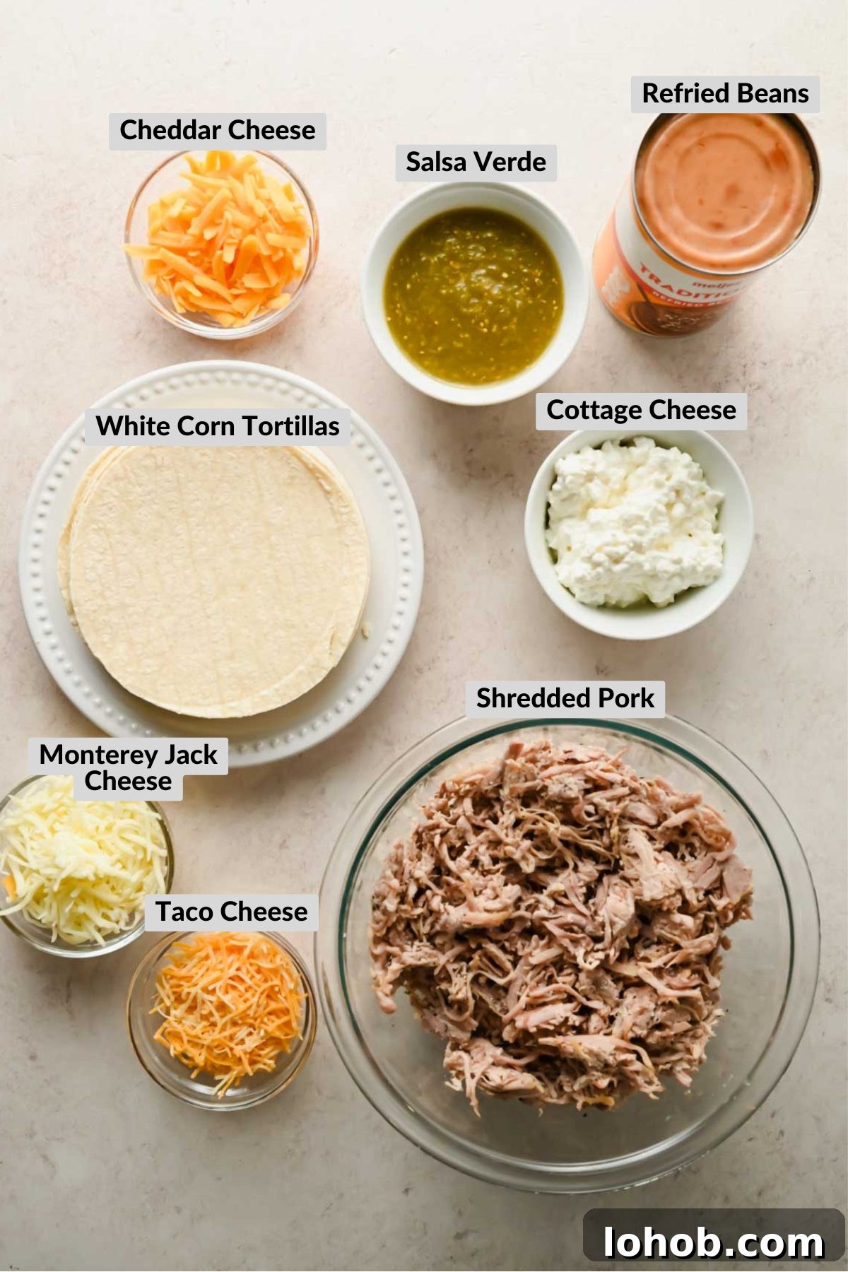 labeled ingredients for crispy baked pork tacos in individual bowls.