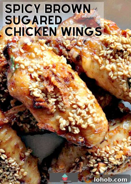 Sticky Spicy Brown Sugar Chicken Wings 2 Spicy Brown Sugared Chicken Wings. Deliciously baked wings, coated in brown sugar, baked onions and spices then coated in sesame seeds. Perfect party food!