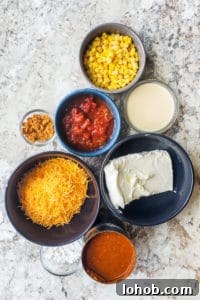 Crockpot Chili Cheese Dip ingredients Chili cheese dip recipe ingredients in bowls on a white counter.