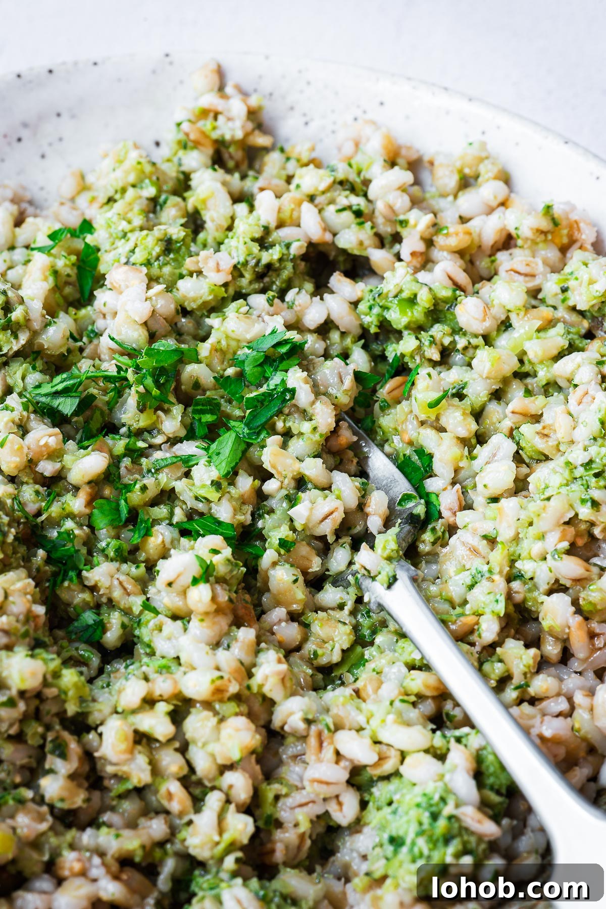 Barley: Instant Pot and Stovetop Cooking Guide 6 Close-up of cooked barley with pesto.