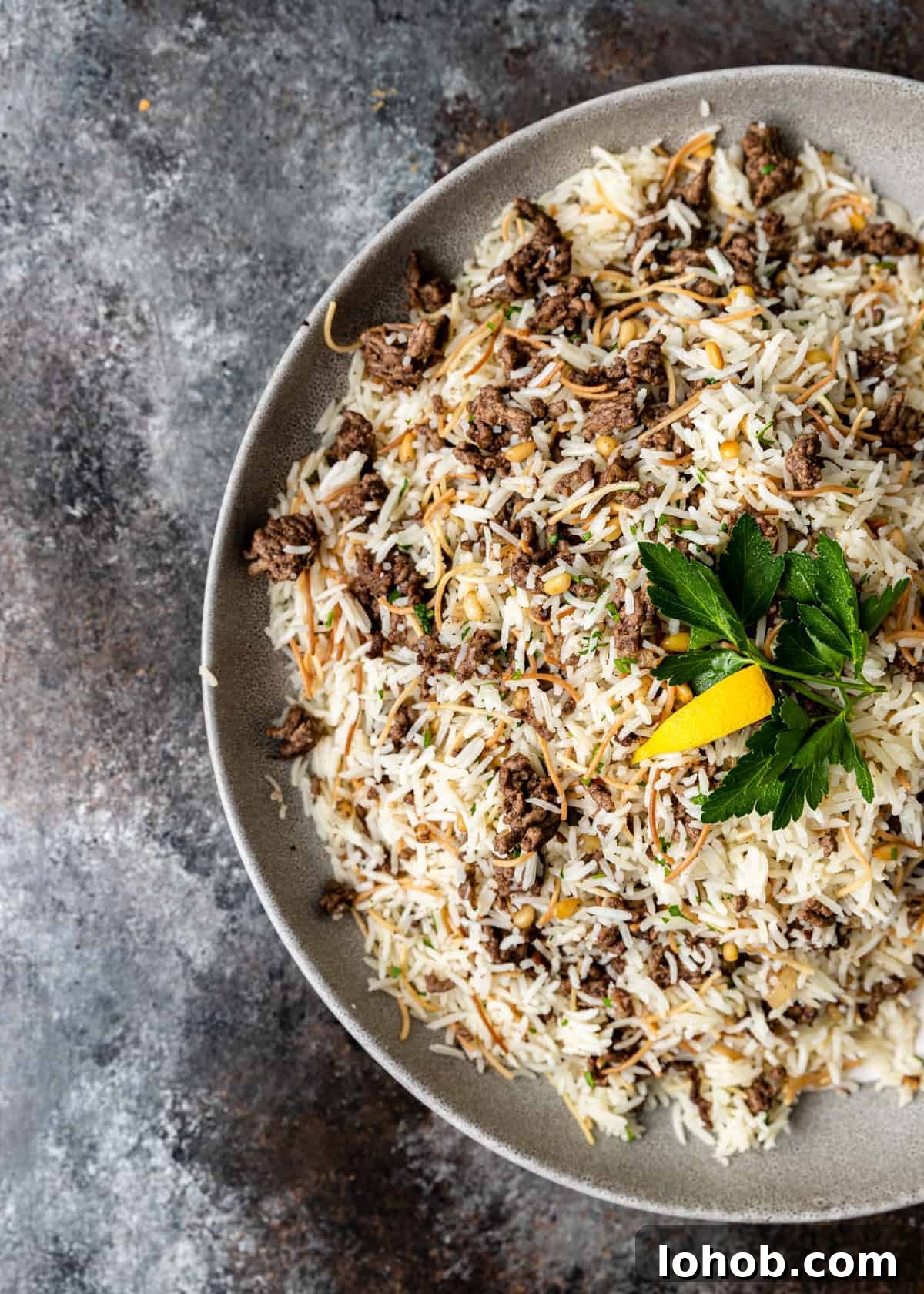 overhead: plate of hashweh ground meat with vermicelli rice