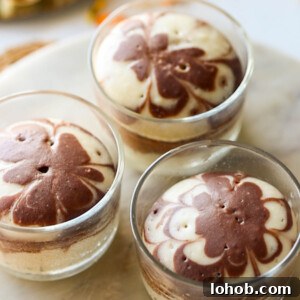 Eggless Marble Cake Without Oven or Microwave — Simple Recipe 4 mini eggless marble cakes placed on a white board