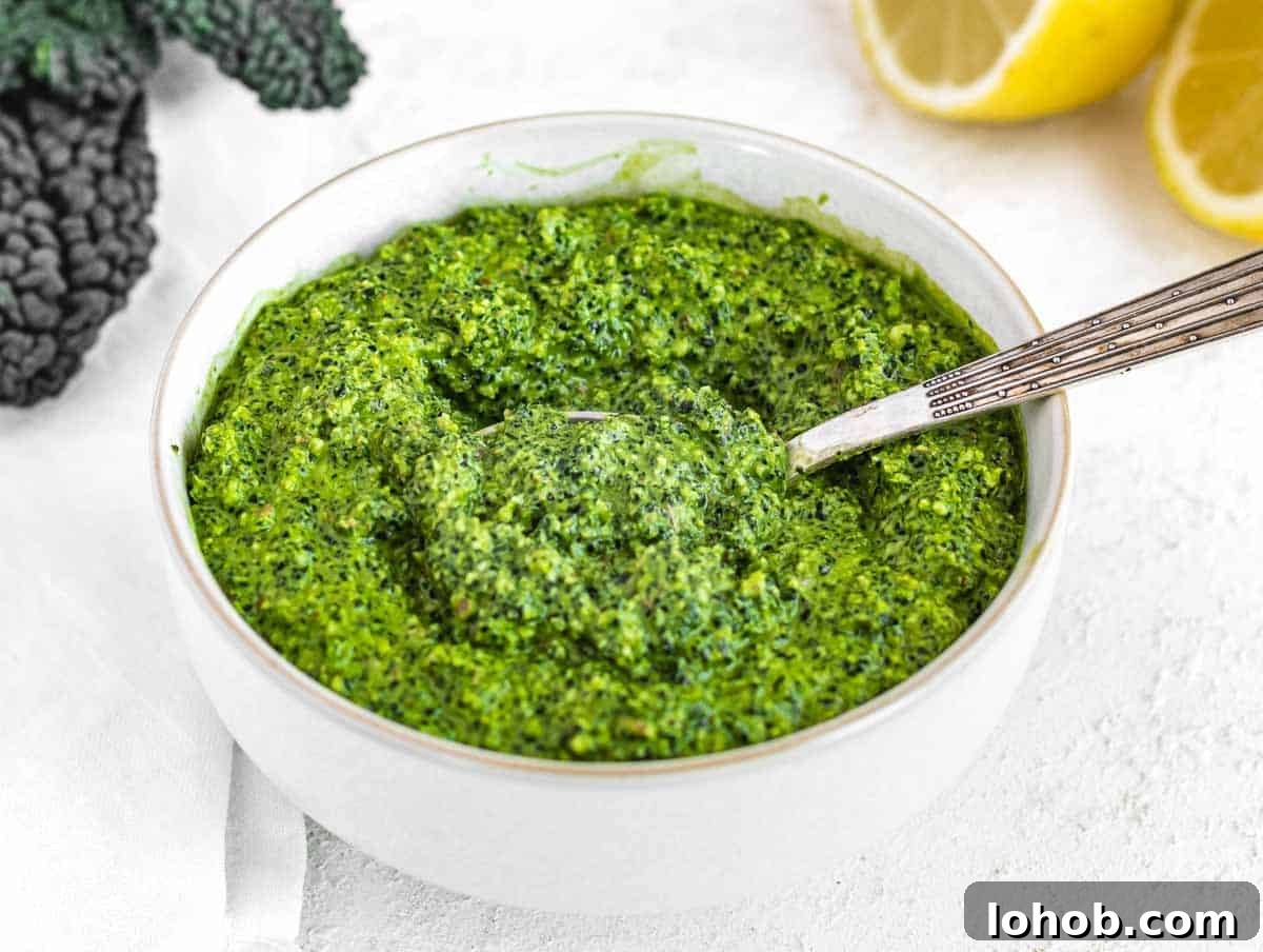 Kale Pesto Recipe: Vibrant Sauce for Pasta, Sandwiches & More 3 Kale Pesto in a white bowl