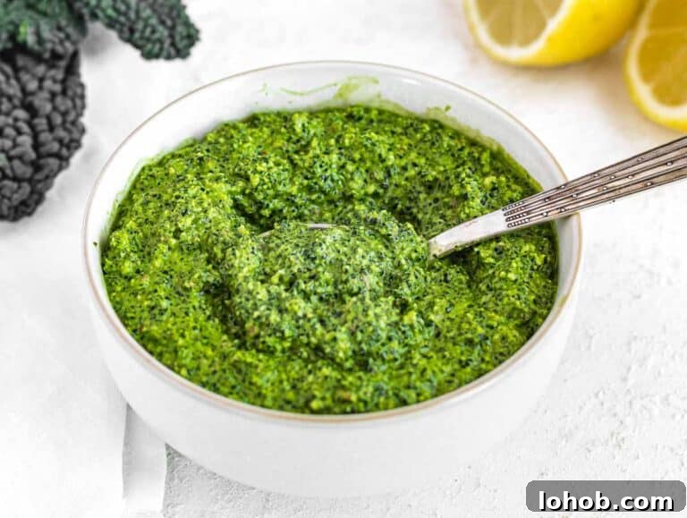 Kale Pesto Recipe: Vibrant Sauce for Pasta, Sandwiches & More 22 Kale Pesto in a white bowl