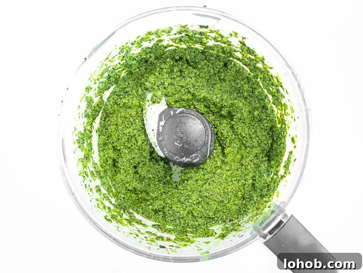 Kale Pesto Recipe: Vibrant Sauce for Pasta, Sandwiches & More 7 Food processor with kale pesto