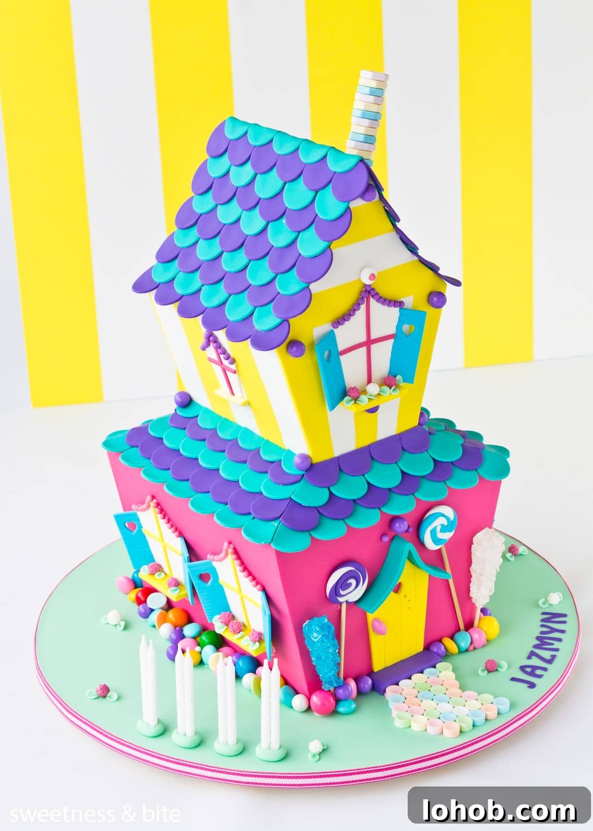 How to Adhere Fondant to Fondant: Guide to Edible Glue 5 A brightly coloured two tier candy house cake.