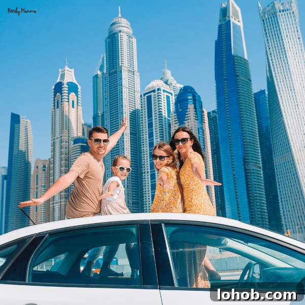 Family Vacation in Dubai: Essential Tips for Traveling with Kids 2 A happy family in stylish summer outfits enjoying a vacation in Dubai, standing in a car with the city’s iconic skyscrapers in the background.