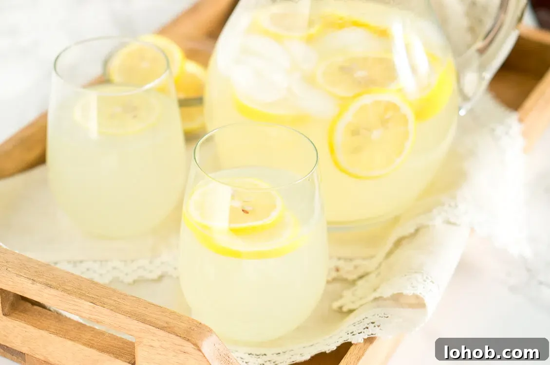 Refreshing Homemade Lemonade Recipe for Perfect Summer Sips 3 homemade lemonade recipe served in glasses on a wooden tray
