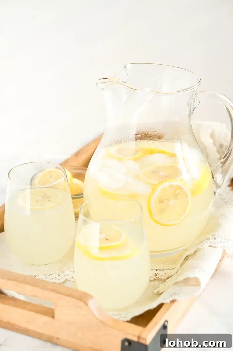 Refreshing Homemade Lemonade Recipe for Perfect Summer Sips 5 lemonade - with a pitcher and glasses