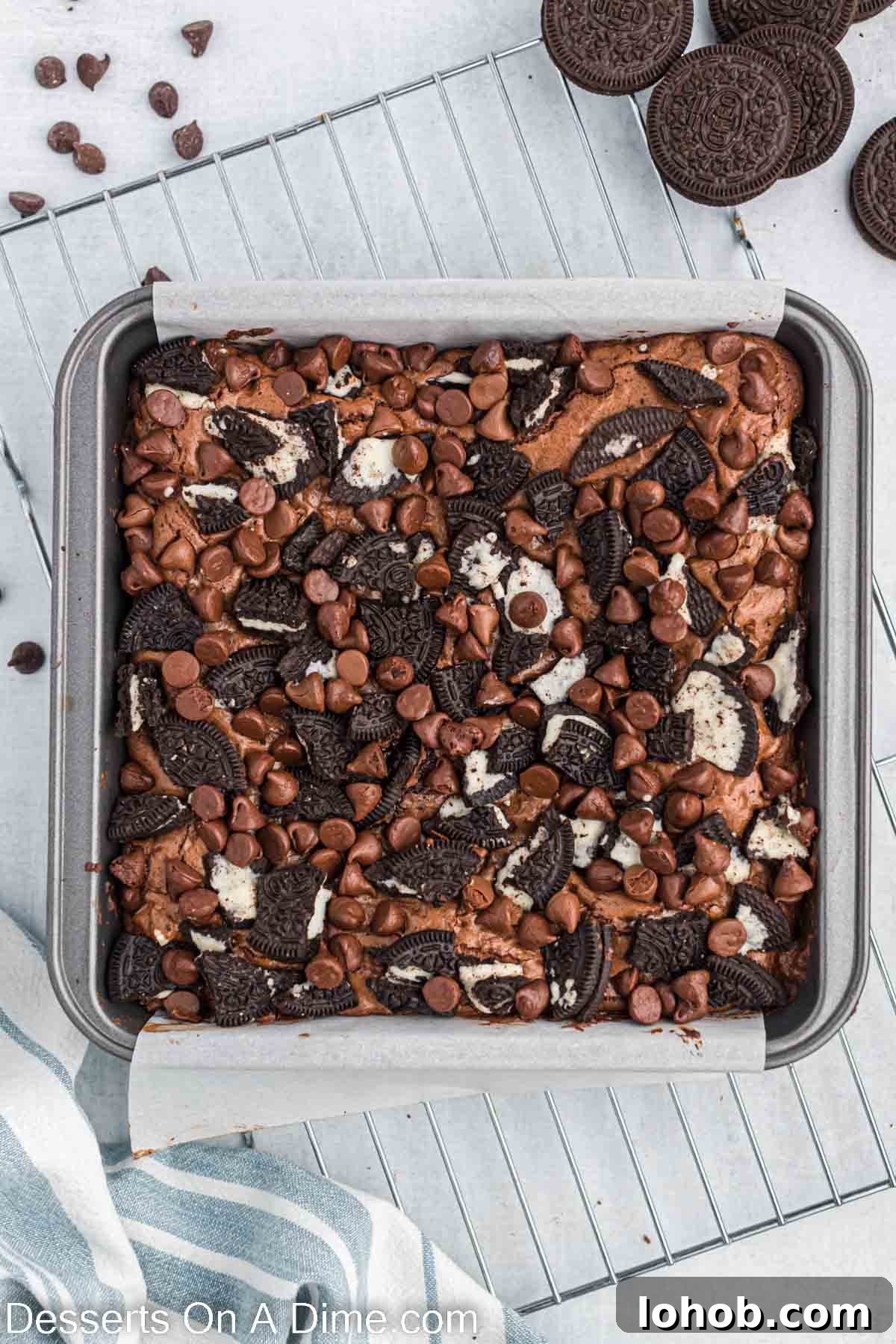 Fudgy Oreo Brownies Recipe with Creamy Cookie Filling 9 Brownies baked and cooling.