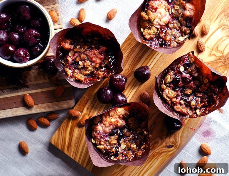 Cherry Almond Muffins with Streusel | ofbatteranddough.com