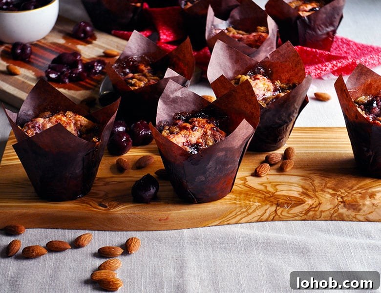 Cherry Almond Muffins with Streusel | ofbatteranddough.com