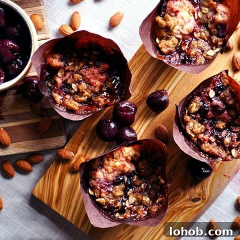 Cherry Almond Muffins with Streusel | ofbatteranddough.com