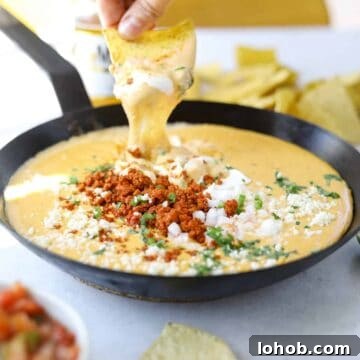 15 Cozy Appetizers for Cold-Weather Entertaining 3 Creamy queso dip with chorizo