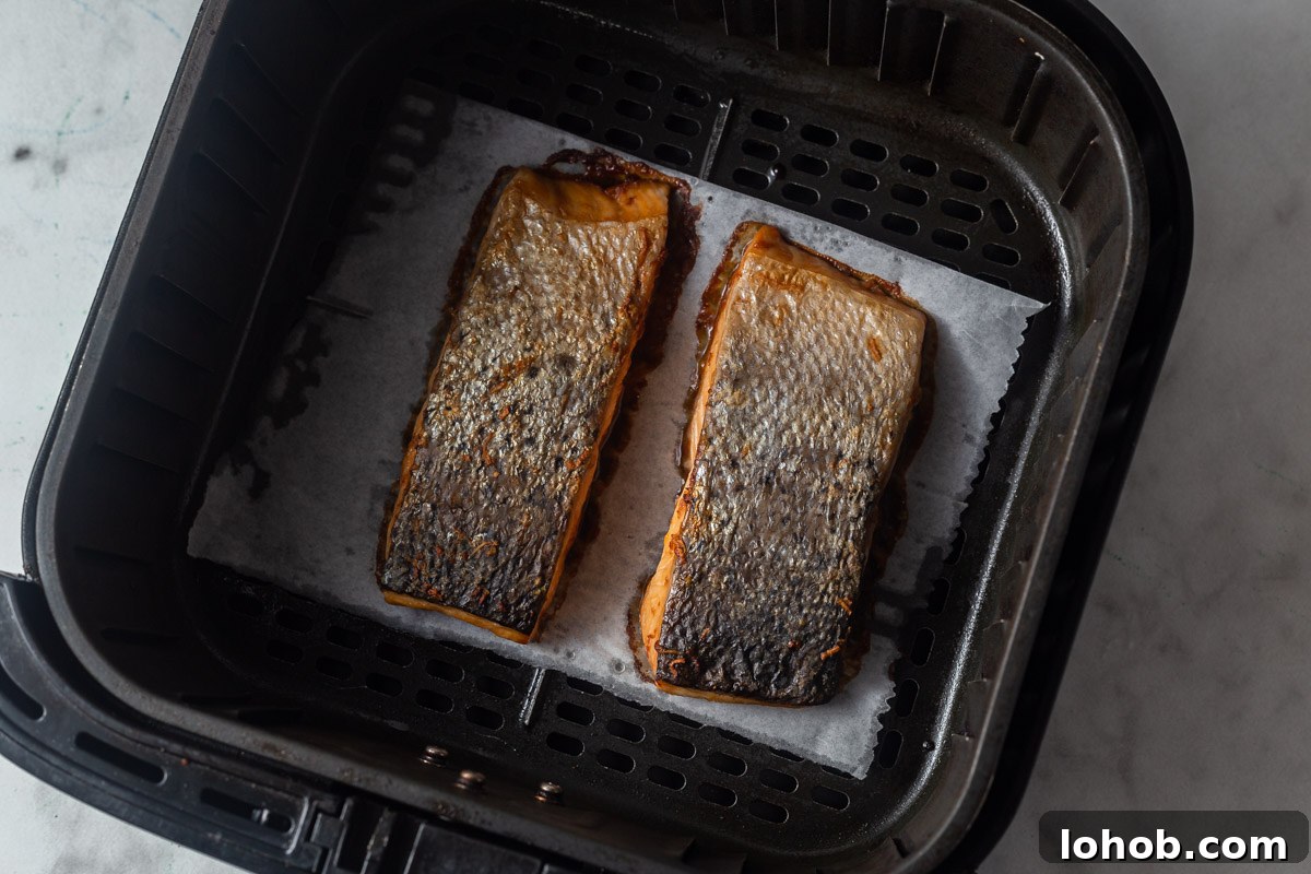 Crispy Air Fryer Teriyaki Salmon 7 teriyaki salmon in the air fryer.