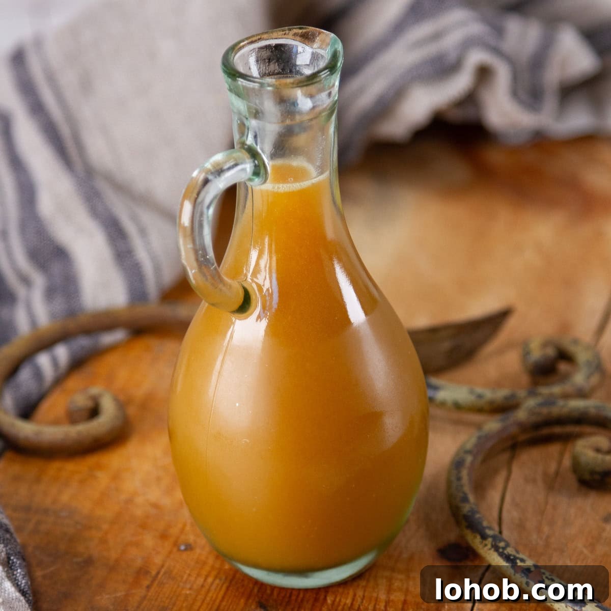 Alcohol-Free Drinks: Creative Mocktails & Refreshing Alternatives 12 square crop of a glass jar of flavored syrup.