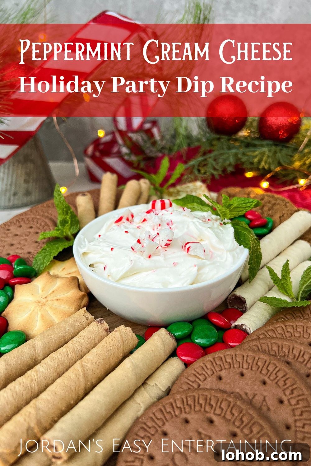 Peppermint Cream Cheese Holiday Dip Recipe for Festive Parties 2 a dessert platter filled with cookies and a bowl of peppermint cream cheese dip with crushed peppermint candies in the center