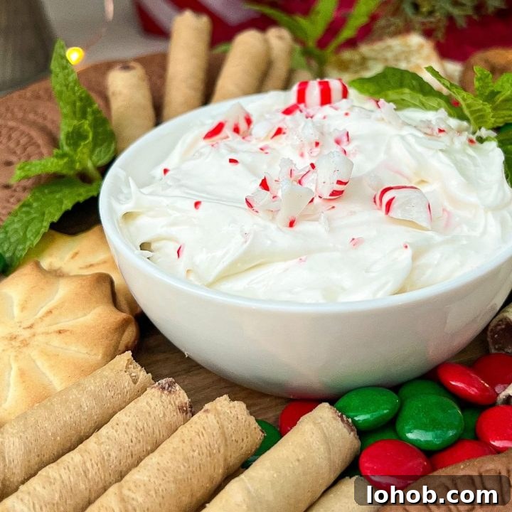 a peppermint cream cheese sip topped with crushed peppermints for a holiday party dessert