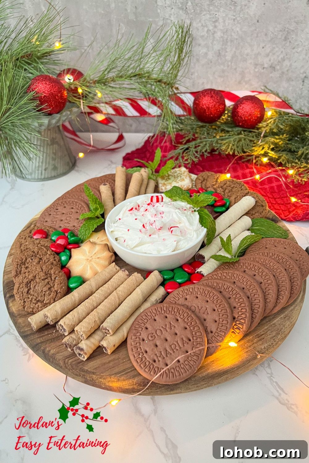 Peppermint Cream Cheese Holiday Dip Recipe for Festive Parties 4 A holiday party dessert platter with a peppermint cheesecake dip recipe at the center