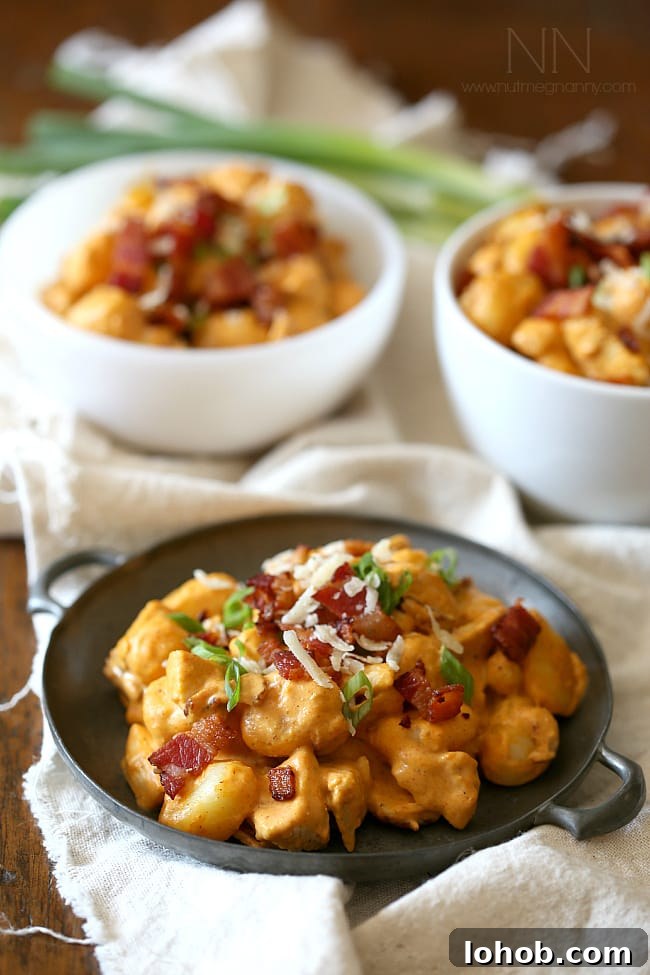 Chicken Bacon Pumpkin Gnocchi topped with extra bacon.